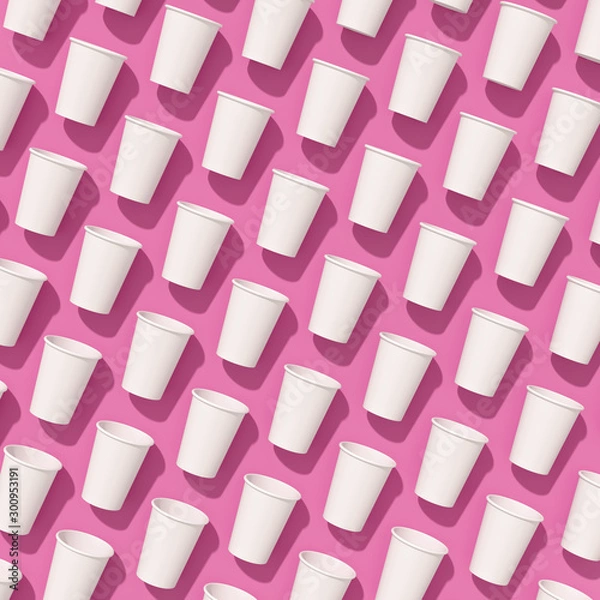 Obraz Pattern of empty paper disposable cups are laying on a background with hard shadows