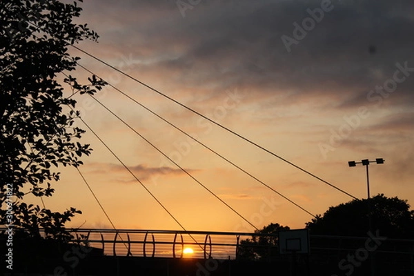 Fototapeta sunset on bridge