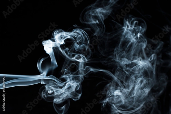 Fototapeta Photo of a wisp of smoke on a dark background