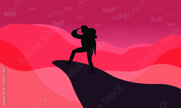Obraz The black silhouette of a traveler or explorer standing on top of a mountain or cliff and looking straight. Trendy flat illustration concept of discovery, exploration, hiking, adventure tourism travel
