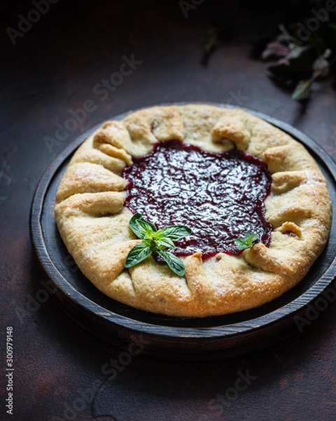 Fototapeta Homemade open cake made of red currant shortcrust pastry, gallette