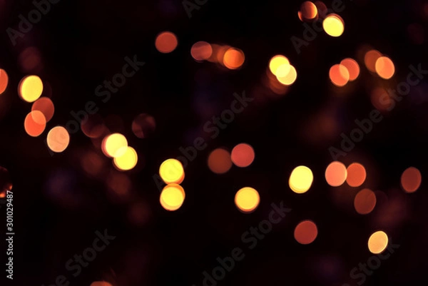 Obraz Multi-colored bokeh on a dark background. Abstraction