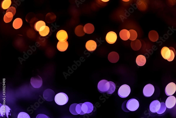 Obraz Multi-colored bokeh on a dark background. Abstraction