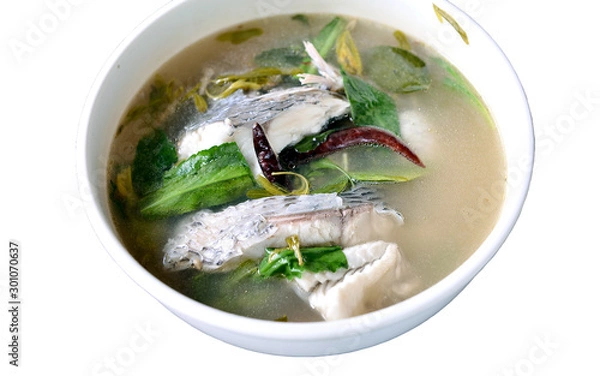 Fototapeta hot and sour soup tilapia fish in white plate . selective focus.