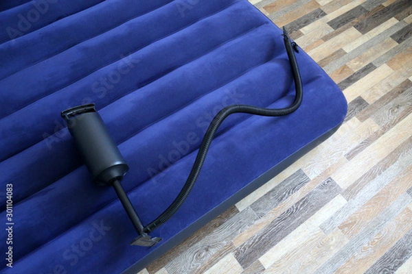 Obraz  Air bed inflatable mattress and foot pumper good for sleep. Portable and cheap bed.