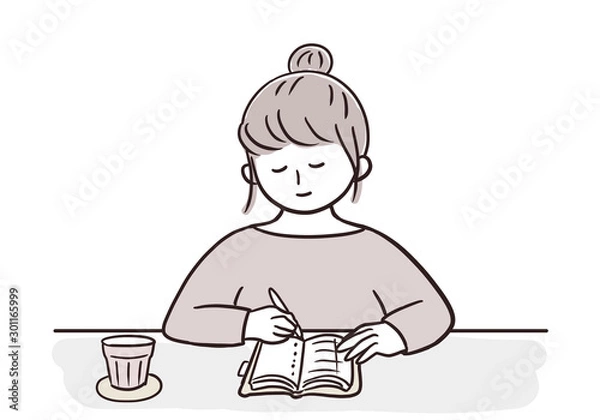 Obraz 机でノートに書く女性