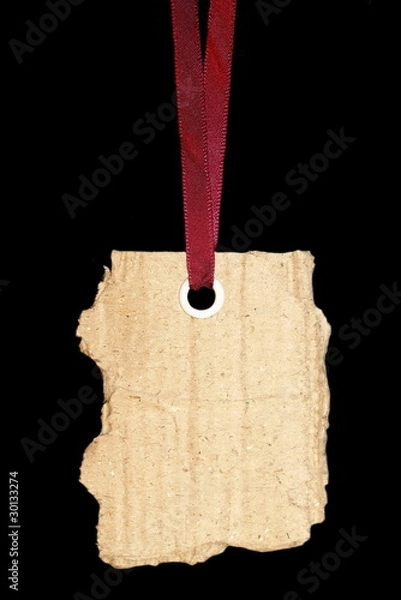 Fototapeta cardboard blank tag isolated on black background