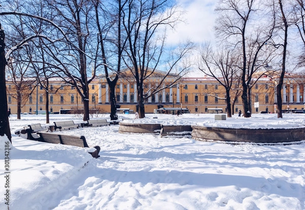 Fototapeta Beautiful winter landscape with snow-white trees, architecture at frosty snow winter day, St Petersburg, Russia.