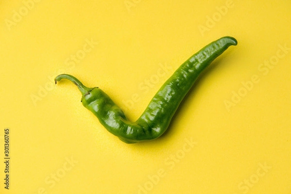 Obraz Ugly products, vegetables on a colored yellow background. Pepper. Consent. Okay Check mark organic.