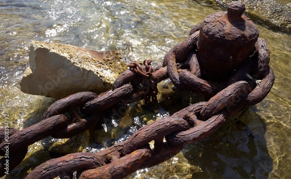 Fototapeta Heavy Rusty Shipping Anchor Chain on the seashore of Manoel Island Malta