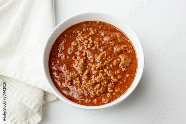 Fototapeta Top view of a bowl of red chili. Copy space. 