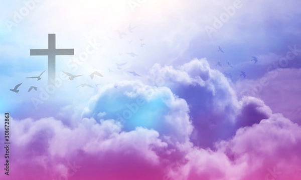 Obraz Christian cross appeared bright in the sky with soft fluffy clouds, white, beautiful colors. With the light shining as hope, love and freedom in the sky background