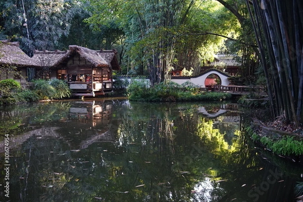 Fototapeta Beautiful lake with bamboo garden in Thatched Cottage of Du Fu, it was the home of a famous poet, Du Fu, in Tang Dynasty. 
