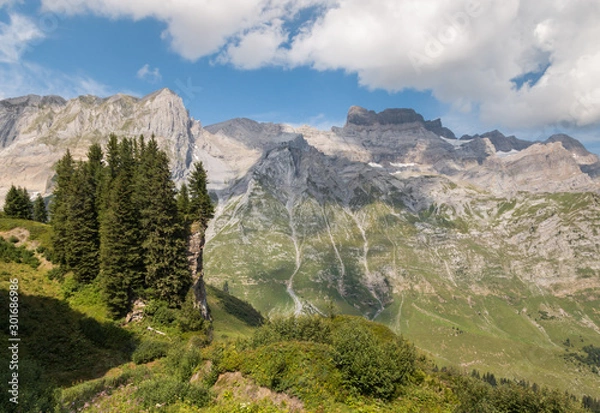 Obraz mountain range in Glarus Alps in Switzerland with blue sky and copy space