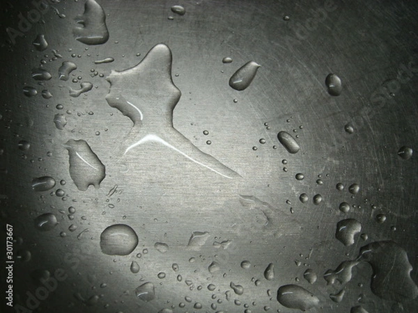 Obraz Water on a metal surface.