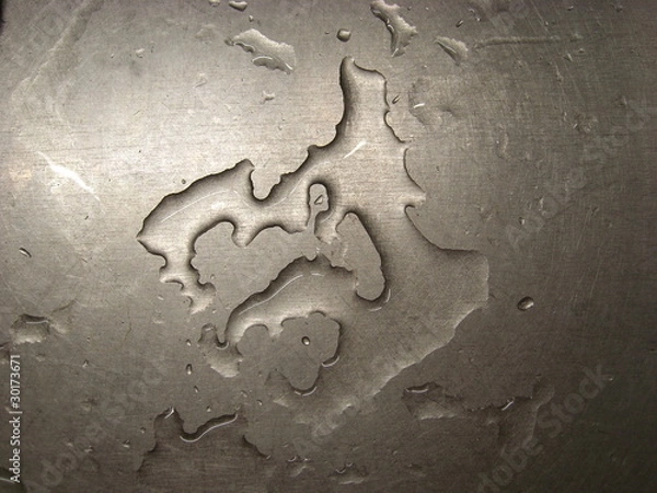 Obraz Water on a metal surface.
