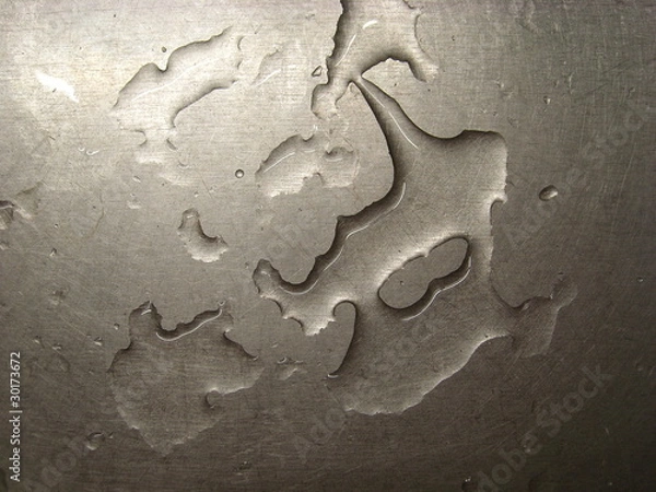 Obraz Water drops on a metal surface.