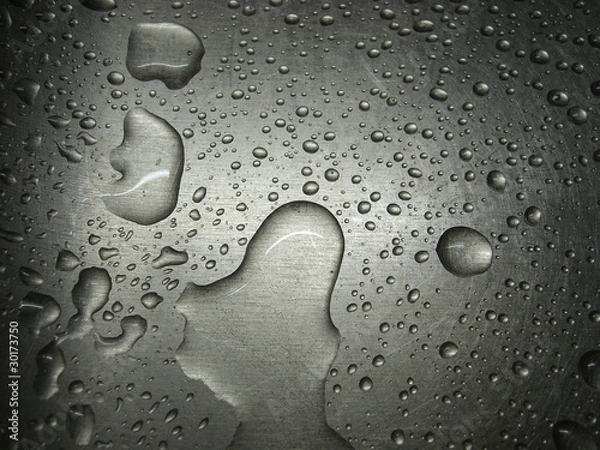 Obraz Water drops on a metal surface.