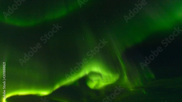 Fototapeta Aurora at night in the sky in the north.