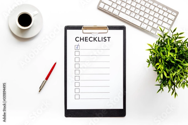 Fototapeta Checklist on white office background top view