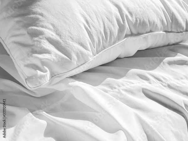 Obraz Abstract black and white tone of pillow  on wrinkle bed cover sheet on the bed in the bedroom.