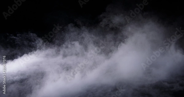 Fototapeta Realistic dry ice smoke clouds fog overlay perfect for compositing into your shots. Simply drop it in and change its blending mode to screen or add.