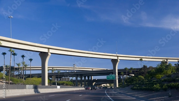 Fototapeta highway interchange above palms