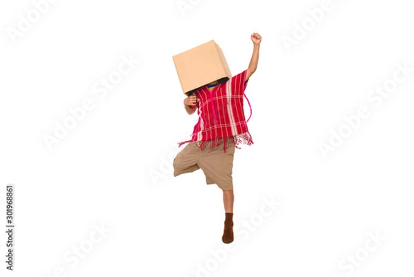 Fototapeta Young boy over isolated white background holding a box to move it to another,brown box