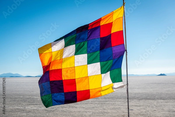 Fototapeta The colourful patchwork Wiphala represents the native people from parts of the Andes that travels through Bolivia, Peru, Ecuador, Argentina and Chile with the central colour composed of the most squar