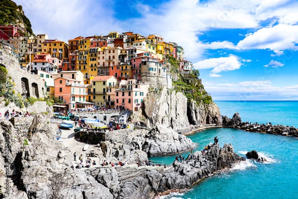 Obraz Exploring the coastal village of Manarola,  which is a small village in the Liguria region of Italy known as Cinque Terra
