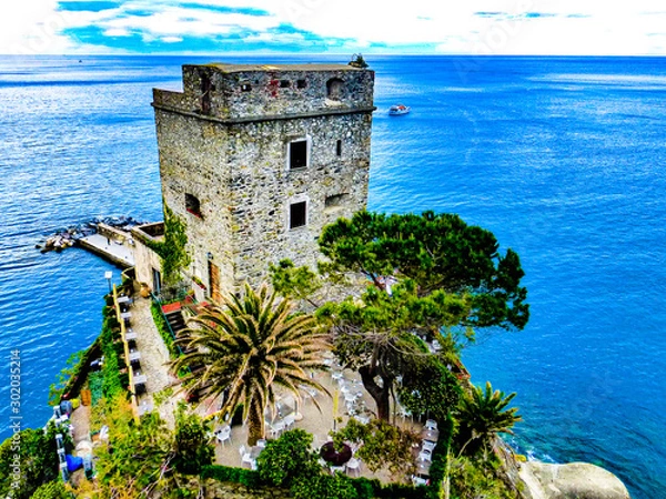 Obraz exploring Torre Aurora, Down Tower, at  the costal village of Riomaggiore which is a small village in the Liguria region of Italy known as Cinque Terra