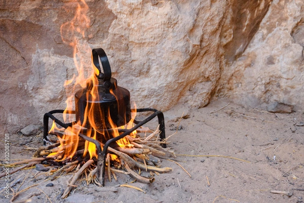 Obraz an iron kettle on bonfire