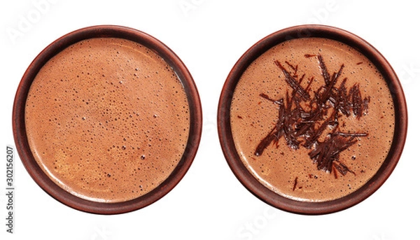 Fototapeta Two cups of hot chocolate or cocoa drink isolated on white