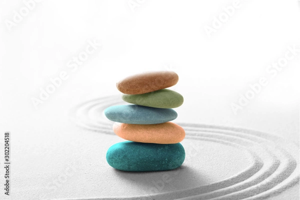 Obraz zen stone concept, multi colors  stones piled on the sand with copy space for your text