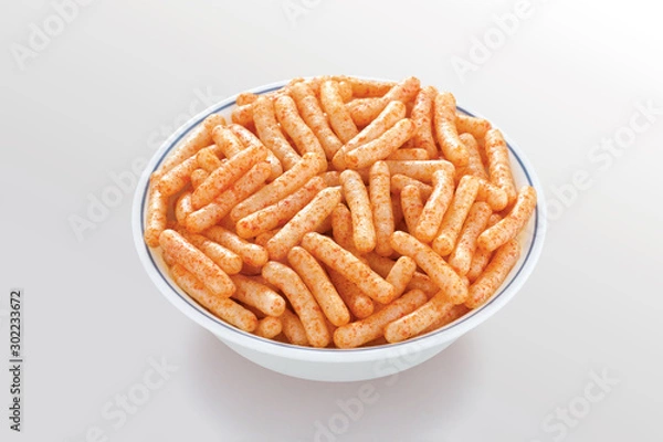 Fototapeta Fried and Spicy Stick, Sali Sev, noodles, Snacks or Fryums (Snacks Pellets) White background. selective focus - Image
