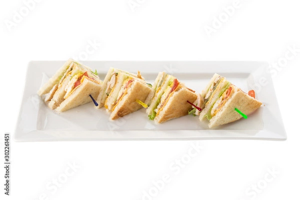 Fototapeta Club sandwiches with chicken, bacon, cheese and pickle isolated on white background