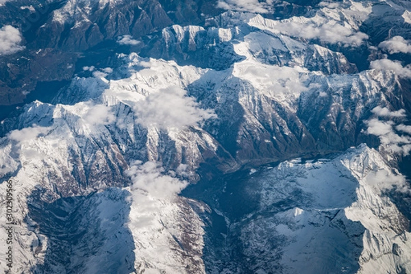 Fototapeta Birds eye view of the Alps over Switzerland