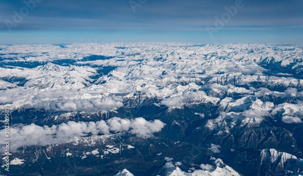 Fototapeta Birds eye view of the Alps over Switzerland