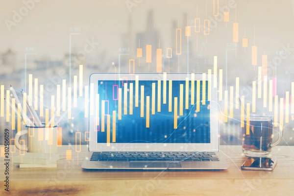 Fototapeta Forex Chart hologram on table with computer background. Multi exposure. Concept of financial markets.
