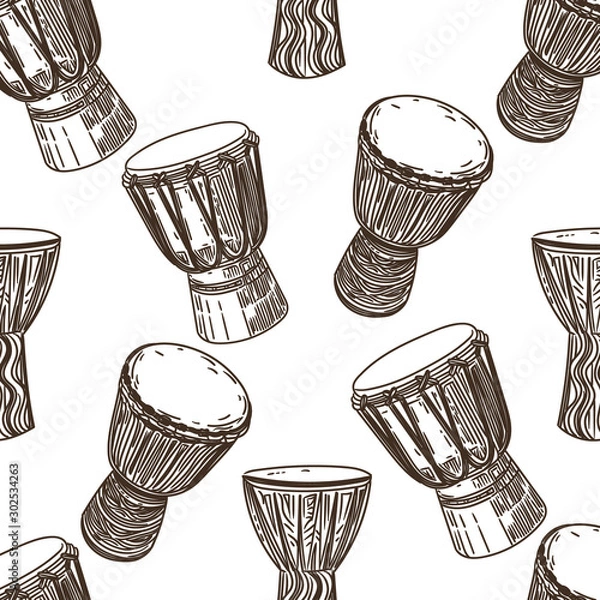 Fototapeta Vector hand drawn seamless pattern of African drums in the style of engraving on white background.