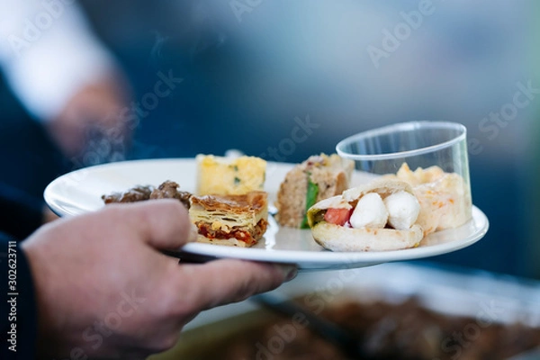 Fototapeta Details of different food at an event or convention congress