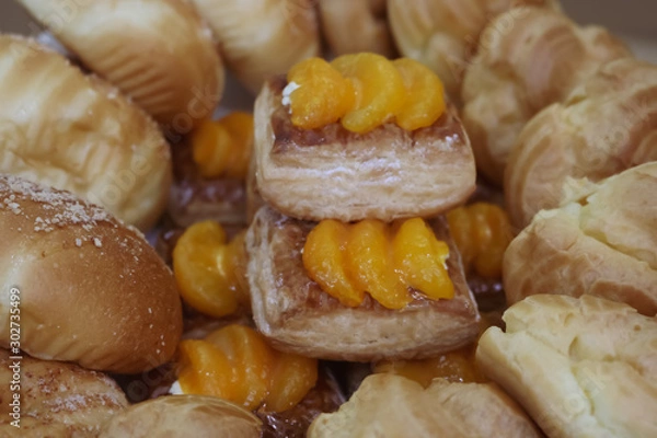 Obraz orange blast pastry at the center of vanilla cream puff