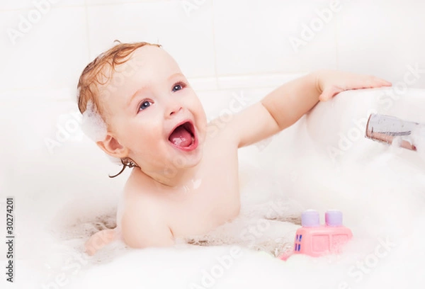 Obraz baby taking a bath