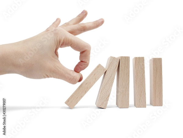 Obraz Hand and falling pieces