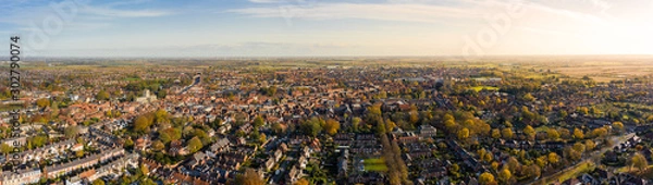 Fototapeta Aerial panoramic shot of Beverley town and Minster from the sky in November 2019 with beautiful autumn colours over the small market town in East Yorkshire, UK