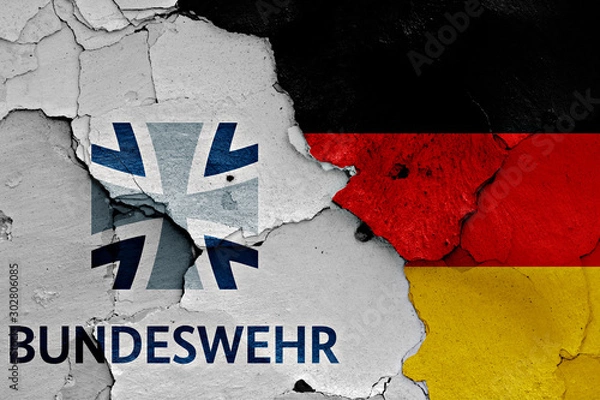 Obraz flags of Bundeswehr and Germany painted on cracked wall