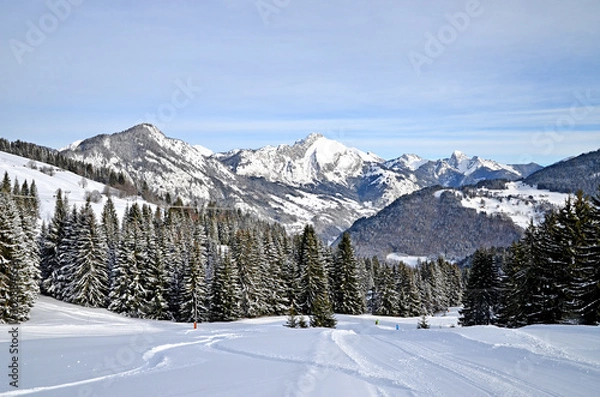 Obraz Beautiful peaceful winter landscape in the Frence Alps, at one of the ski stations, France. The view on the empty ski slopes