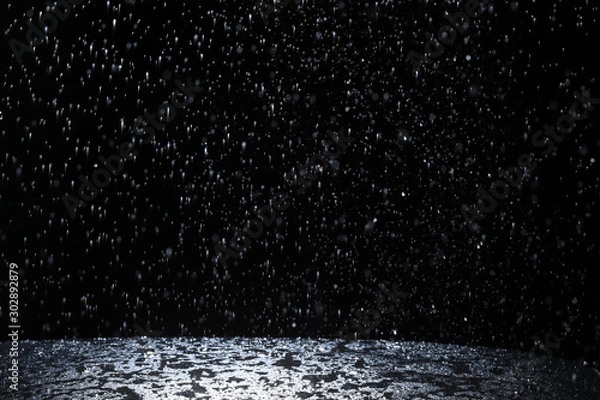Obraz Dark background shot of rain falling