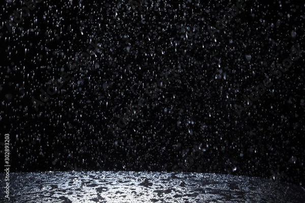 Obraz Dark background shot of rain falling