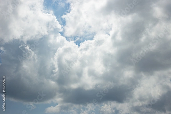 Obraz Blue sky background with white clouds